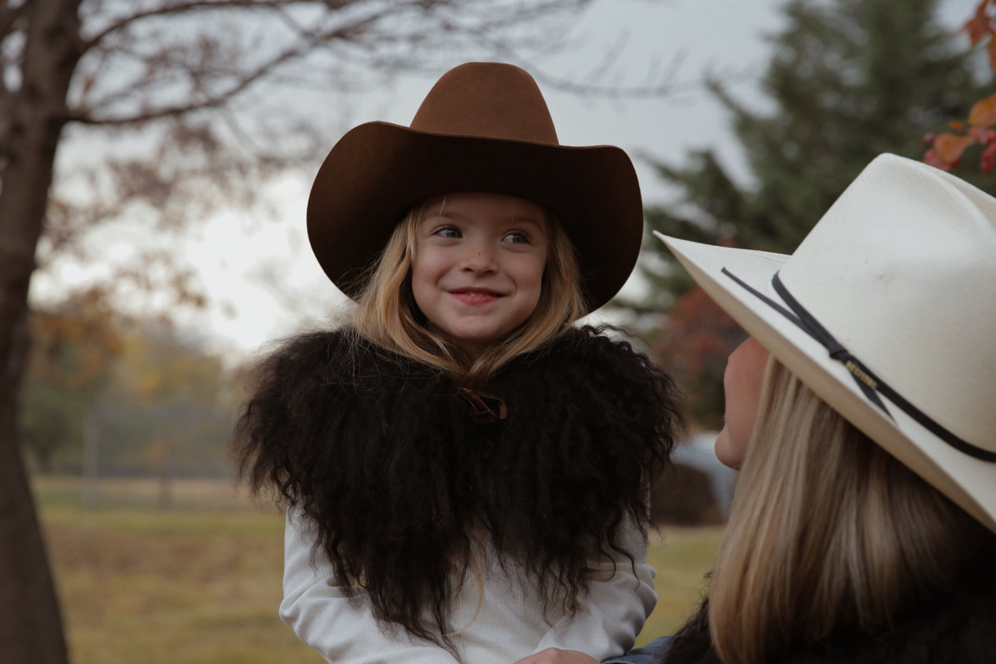 Kids black w/ brown woolie collar